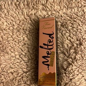 Too faced, melted matte in color: holy chic. New never used no refunds.